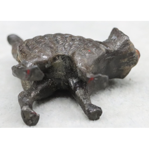 487 - A cold painted bronze style figure of a cat, 5cm long