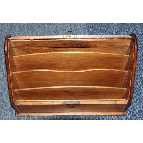 503 - A Victorian walnut tambour topped stationery box enclosing sectioned interior, 36cm wide, 25cm high