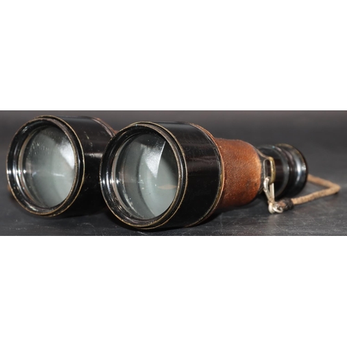 505 - A pair of military L.Petit Fab, Paris black and leather bound binoculars (cased), stamped 