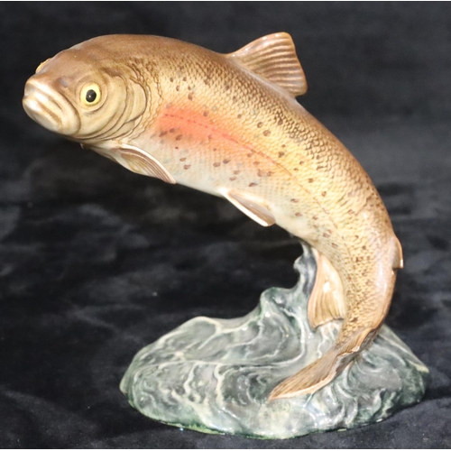 51 - A Beswick figure of a leaping trout, 1032, 16cm high (minute chip to end of tail)