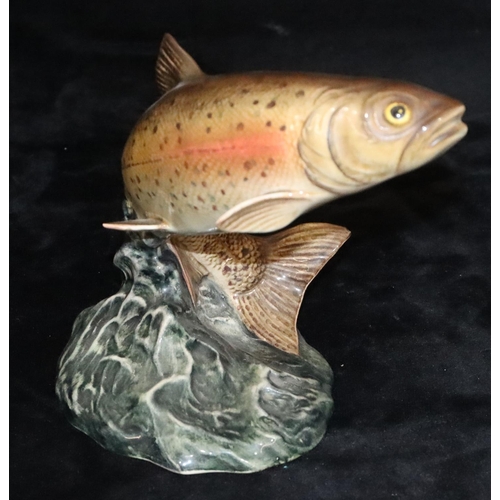 51 - A Beswick figure of a leaping trout, 1032, 16cm high (minute chip to end of tail)