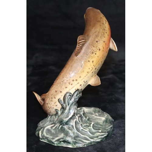 51 - A Beswick figure of a leaping trout, 1032, 16cm high (minute chip to end of tail)