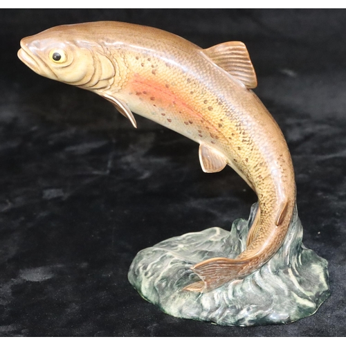 51 - A Beswick figure of a leaping trout, 1032, 16cm high (minute chip to end of tail)