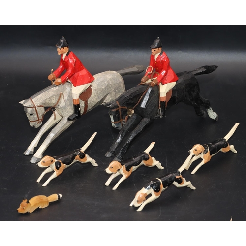 512 - Frank Whittington, Forest Toys of Brockenhurst, carved fox hunting group, grey horse galloping with ... 