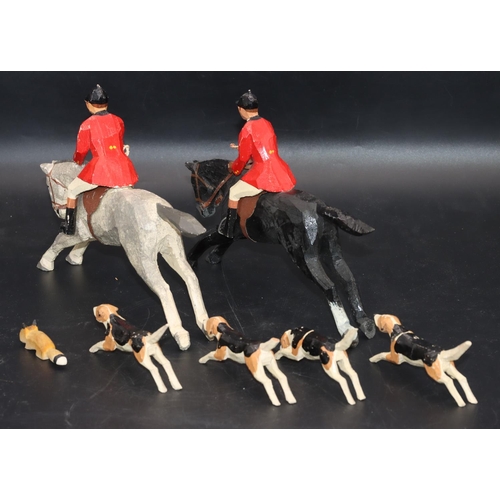 512 - Frank Whittington, Forest Toys of Brockenhurst, carved fox hunting group, grey horse galloping with ... 