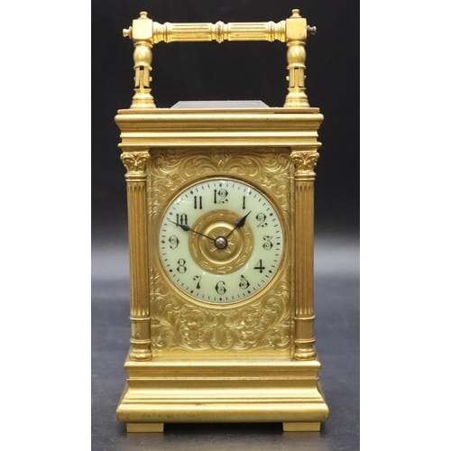 528 - A 19th Century brass half-strike carriage clock with circular cream enamelled chapter ring with Arab... 