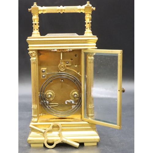 528 - A 19th Century brass half-strike carriage clock with circular cream enamelled chapter ring with Arab... 