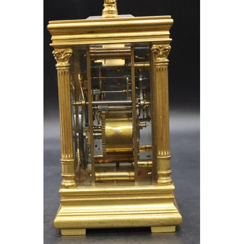 528 - A 19th Century brass half-strike carriage clock with circular cream enamelled chapter ring with Arab... 