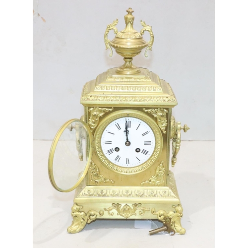 531 - Japy Freres 8-day striking gilt metal mantel clock with urn motif and allover raised leaf and scroll... 