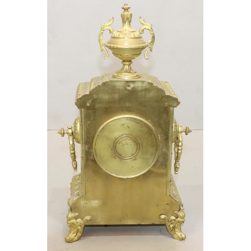 531 - Japy Freres 8-day striking gilt metal mantel clock with urn motif and allover raised leaf and scroll... 