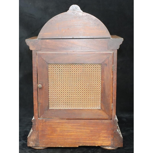 535 - A German W & H oak 8-day striking Westminster chime mantel clock with allover shell and leaf decorat... 