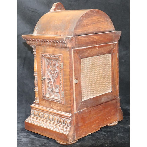 535 - A German W & H oak 8-day striking Westminster chime mantel clock with allover shell and leaf decorat... 