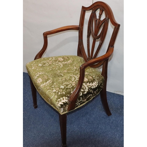 544 - A 19th Century mahogany Hepplewhite carving chair with carved pierced back, green floral velvet over... 