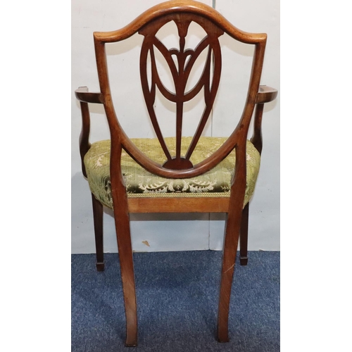 544 - A 19th Century mahogany Hepplewhite carving chair with carved pierced back, green floral velvet over... 