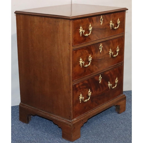 548 - A 19th Century mahogany small straight front chest of drawers with 3 long drawers and drop brass han... 