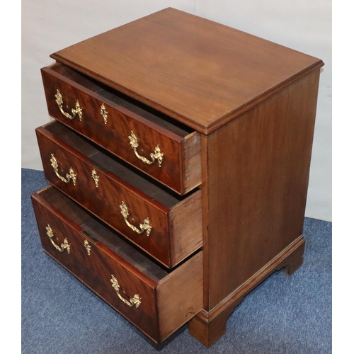 548 - A 19th Century mahogany small straight front chest of drawers with 3 long drawers and drop brass han... 