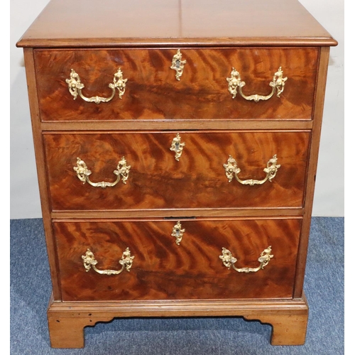 548 - A 19th Century mahogany small straight front chest of drawers with 3 long drawers and drop brass han... 