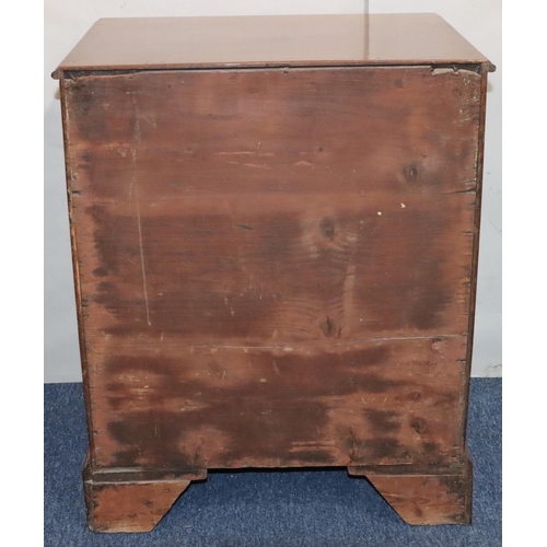 548 - A 19th Century mahogany small straight front chest of drawers with 3 long drawers and drop brass han... 