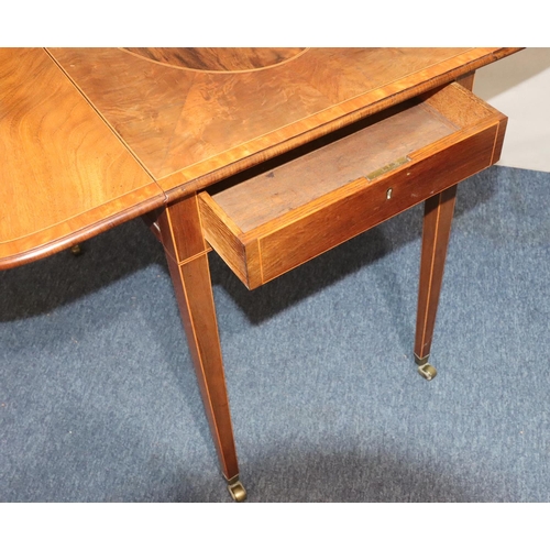 549 - A 19th Century mahogany Pembroke table with allover inlaid stringing and banding, oval centre panel,... 