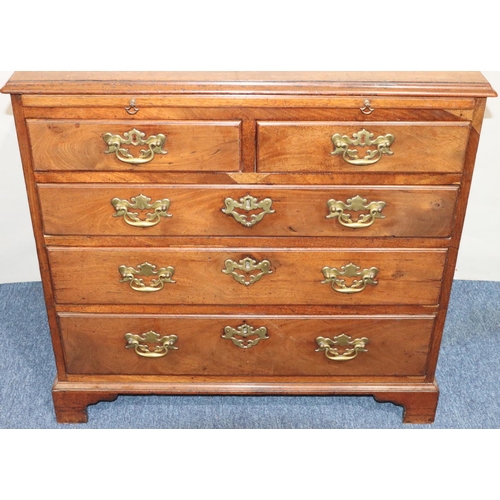 553 - A George III mahogany small straight front chest of drawers with brush slide, 2 short and 3 long gra... 