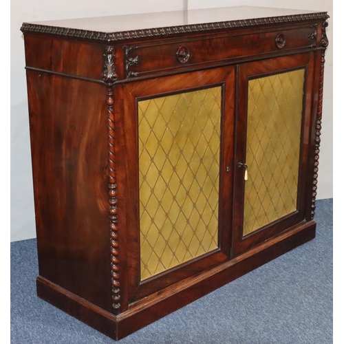 555 - A 19th Century figured mahogany chiffonier with 1 long drawer above 2 leather panelled doors with ra... 