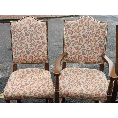 568 - A set of 6 good quality oak dining chairs with cream floral overstuffed seated and backs with studde... 