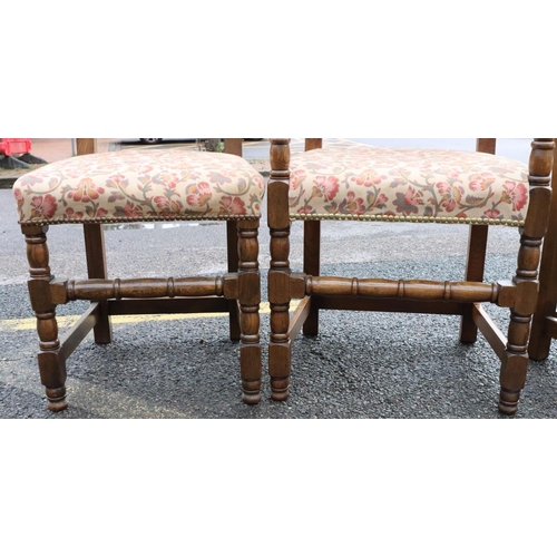 568 - A set of 6 good quality oak dining chairs with cream floral overstuffed seated and backs with studde... 