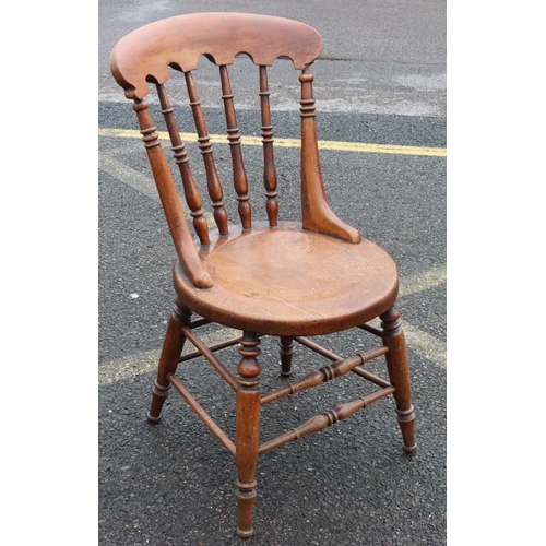 569 - A 19th Century mahogany single chair with turned stick back, circular solid seat on round turned leg... 