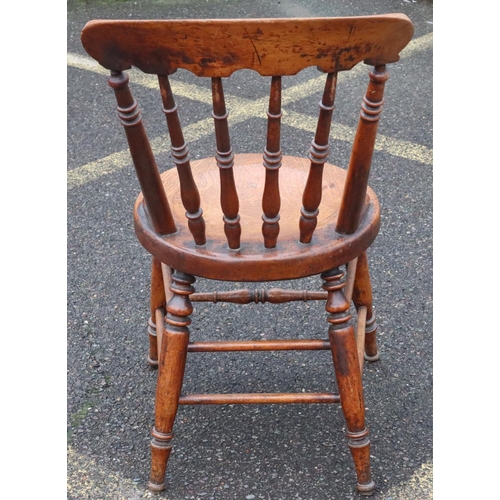 569 - A 19th Century mahogany single chair with turned stick back, circular solid seat on round turned leg... 