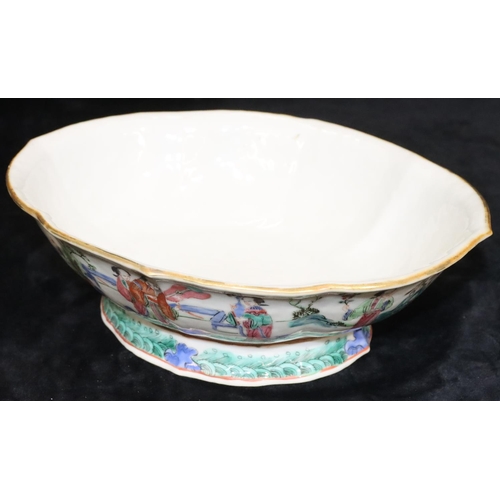 58 - A 19th Century Cantonese oval bowl with crinkle rim on white ground with multi-coloured figure decor... 