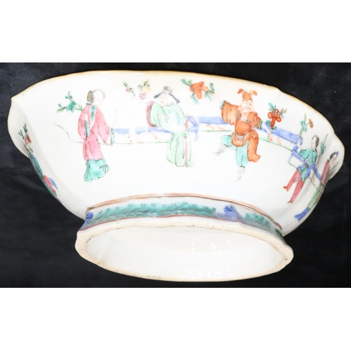 58 - A 19th Century Cantonese oval bowl with crinkle rim on white ground with multi-coloured figure decor... 