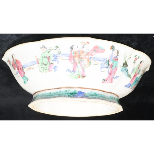 58 - A 19th Century Cantonese oval bowl with crinkle rim on white ground with multi-coloured figure decor... 