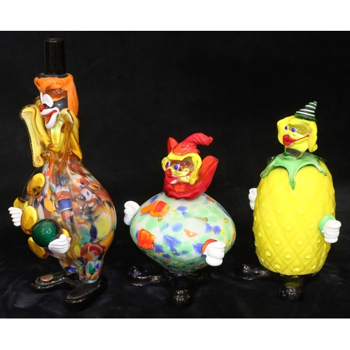 66 - A Murano glass figure of a clown on yellow ground, 24cm high and 2 other Murano glass figures of clo... 