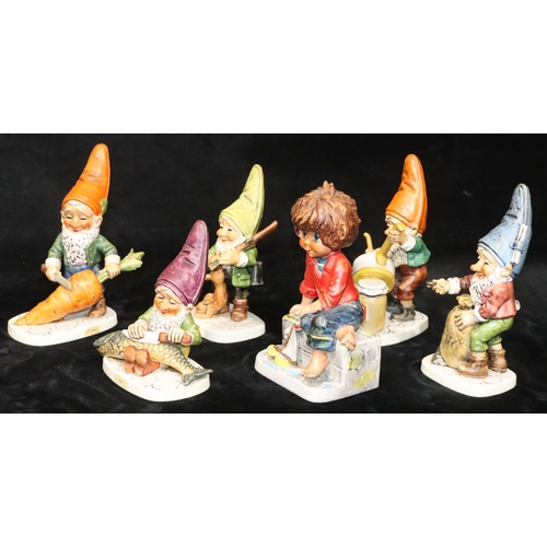 69 - A set of 5 Goebel china figures of Gnomes 