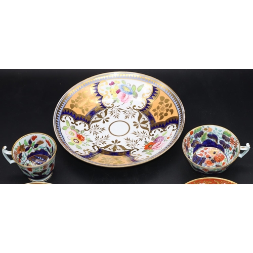 85 - A 19th Century Coalport saucer on Imari patterned ground, another 19th Century saucer, 2 similar cup... 