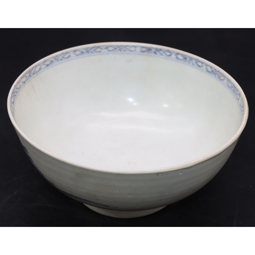 96 - A Nanking Cargo blue and white bowl depicting figure on arched bridge, 15cm diameter