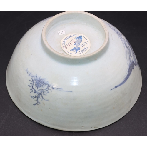 96 - A Nanking Cargo blue and white bowl depicting figure on arched bridge, 15cm diameter