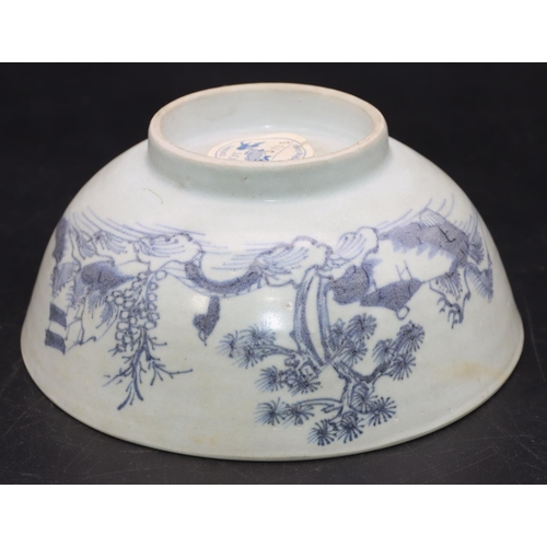 96 - A Nanking Cargo blue and white bowl depicting figure on arched bridge, 15cm diameter