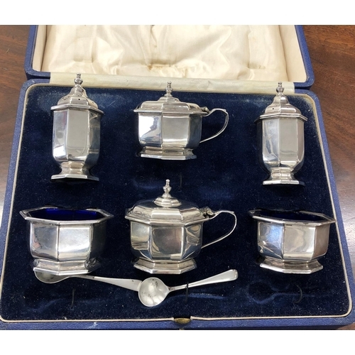 247 - An Edward VII 6 piece silver cruet set with chamfer decoration comprising a pair of mustard pots, a ... 