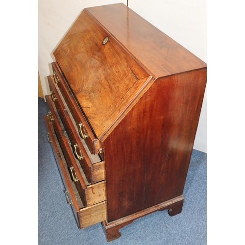 542 - A George III figured mahogany bureau with fall front enclosing fitted interior, panel door, pigeonho... 