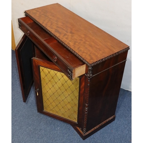 555 - A 19th Century figured mahogany chiffonier with 1 long drawer above 2 leather panelled doors with ra... 