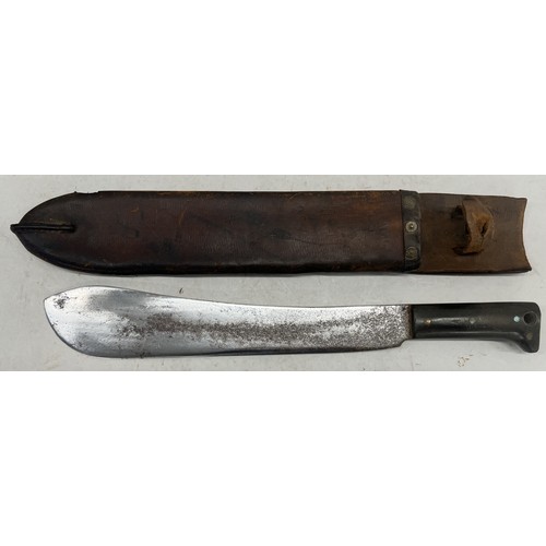 516 - A Burmese style machete with horn handle and leather sheath, 50cm long without sheath