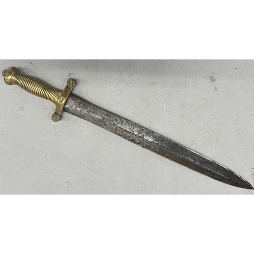 517 - A Continental heavy brass handled short double edged sword with reeded handle, 63.5cm long