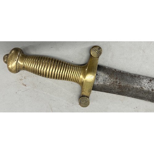 517 - A Continental heavy brass handled short double edged sword with reeded handle, 63.5cm long