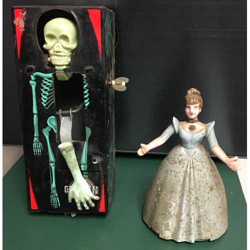 9071 - Yone (Japan) 1960's Mechanical Wind-up Coffin Bank (not working) and a wind-up doll  (working)