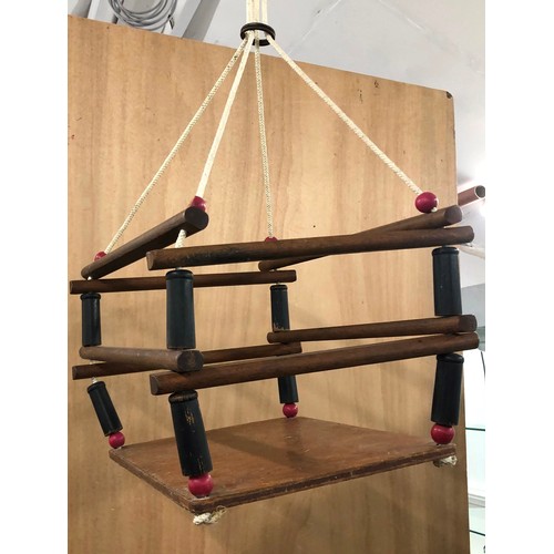 9287 - A vintage wooden child's swing, seat 30cm x 25cm.