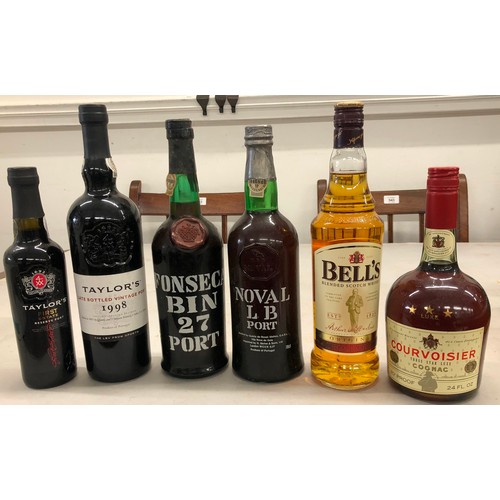 9302 - 4 bottles of Port, 1 bottle of Bell's Whisky and a bottle of Courvoisier Cognac. (6)