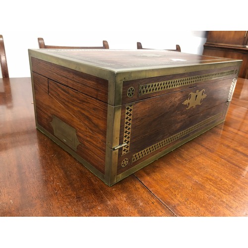 509 - A 19th Century rosewood rectangular shaped writing box/stationery box with allover inlaid brass band... 