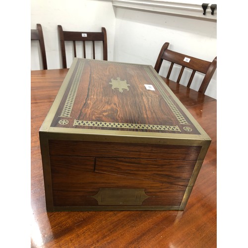 509 - A 19th Century rosewood rectangular shaped writing box/stationery box with allover inlaid brass band... 