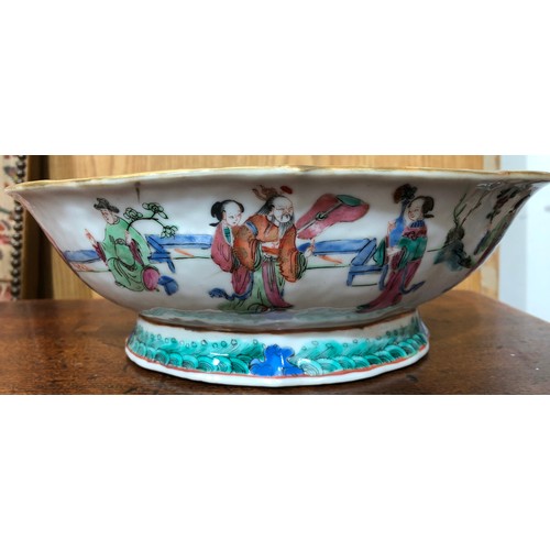 58 - A 19th Century Cantonese oval bowl with crinkle rim on white ground with multi-coloured figure decor... 